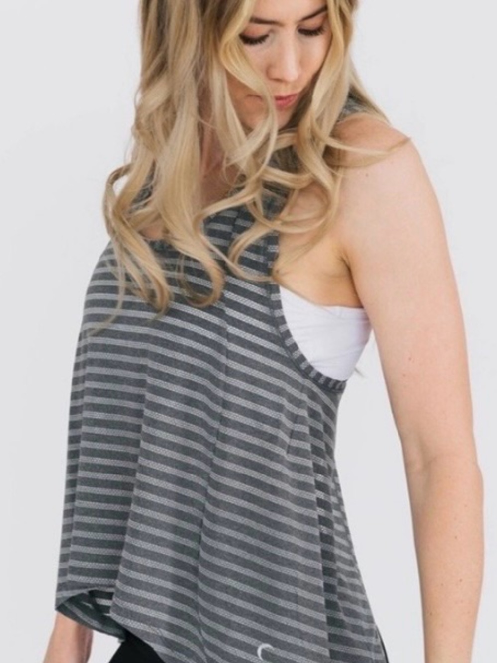 Zyia Active Nimbus
Split Back Tank in a Gray Striped‎ colorway. XL